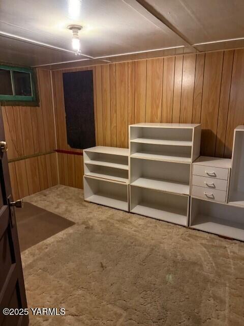 9 W Court St, Union Gap, WA 98903 - unfurnished bedroom with carpet flooring and wooden walls
