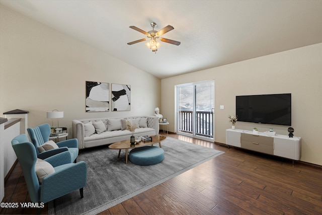 living room with a ceiling fan, lofted ceiling, and dark wood finished floors