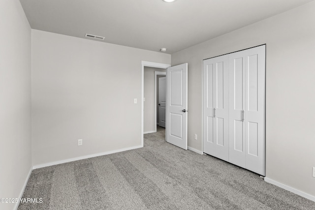 518 Chinook Winds Ln Lot 10, Tieton, WA 98947 - unfurnished bedroom featuring baseboards, visible vents, a closet, and carpet flooring