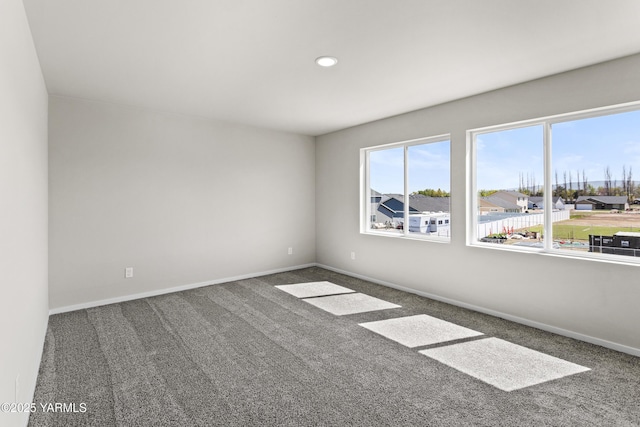 518 Chinook Winds Ln Lot 10, Tieton, WA 98947 - unfurnished room featuring baseboards, carpet floors, a residential view, and recessed lighting