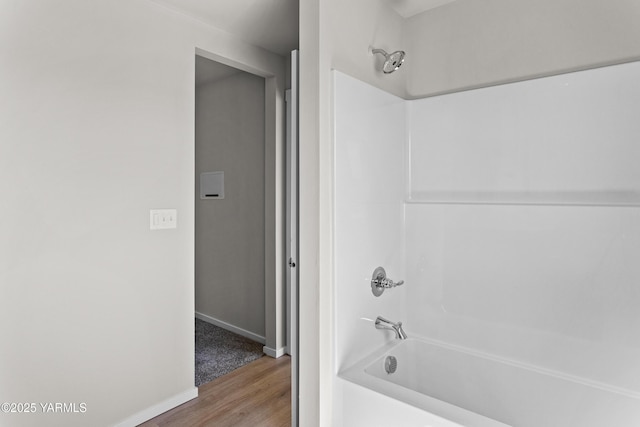 518 Chinook Winds Ln Lot 10, Tieton, WA 98947 - full bathroom featuring wood finished floors, shower / bath combination, and baseboards