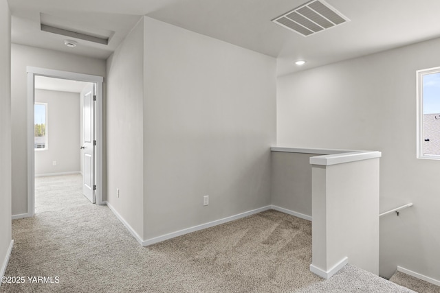 518 Chinook Winds Ln Lot 10, Tieton, WA 98947 - corridor featuring carpet flooring, an upstairs landing, visible vents, and plenty of natural light