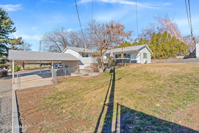 211 N 65th Pl, Yakima, WA 98908 - view of yard with a carport and driveway