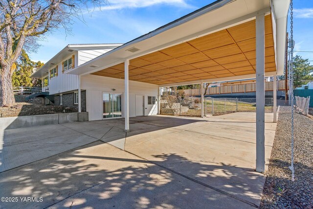 211 N 65th Pl, Yakima, WA 98908 - surrounding community featuring driveway, fence, and an attached carport