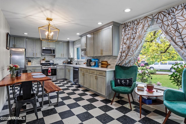 316 N 26th Ave, Yakima, WA 98902 - kitchen with stainless steel appliances, tile patterned floors, healthy amount of natural light, and recessed lighting