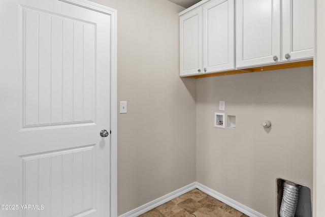 laundry area featuring cabinet space, hookup for a washing machine, and baseboards