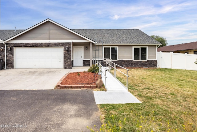 single story home with driveway, stone siding, an attached garage, fence, and a front lawn