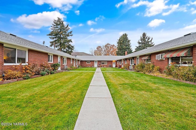 exterior space with a lawn