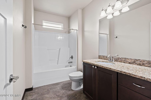 bathroom with toilet, washtub / shower combination, and vanity