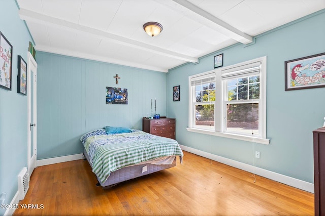 2102 Tieton Dr, Yakima, WA 98902 - bedroom with beamed ceiling, wood-type flooring, and baseboards
