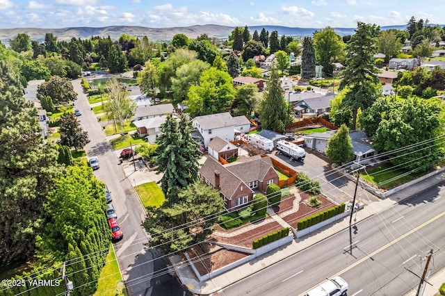 2102 Tieton Dr, Yakima, WA 98902 - aerial perspective of suburban area with a mountain backdrop
