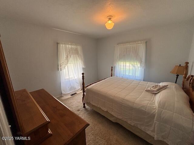 908 W 5th St, Grandview, WA 98930 - bedroom with carpet floors