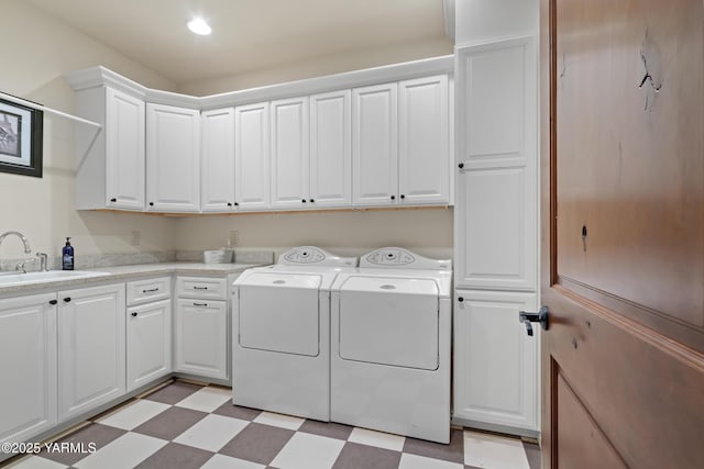 1893 Young Grade Rd, Yakima, WA 98908 - laundry area featuring cabinet space, washer and clothes dryer, and light floors