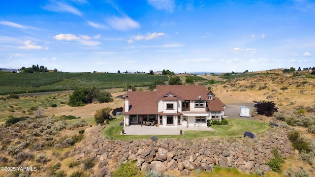 1893 Young Grade Rd, Yakima, WA 98908 - back of property featuring a patio, a view of countryside, and a chimney