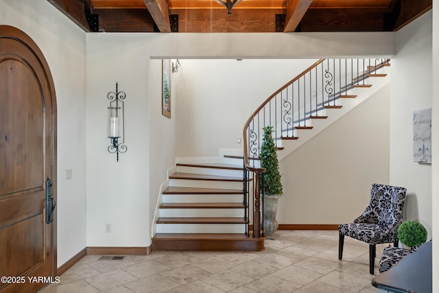 1893 Young Grade Rd, Yakima, WA 98908 - tiled entryway featuring stairs, baseboards, and beamed ceiling