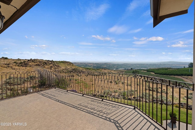 1893 Young Grade Rd, Yakima, WA 98908 - view of patio with a balcony, a mountain view, and a view of rural / pastoral area