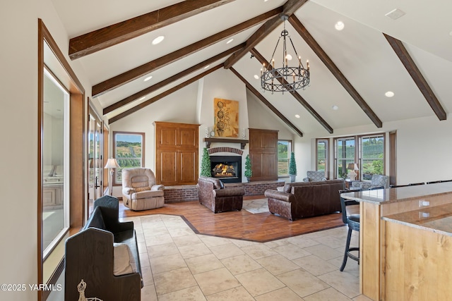 1893 Young Grade Rd, Yakima, WA 98908 - living room with a chandelier, beamed ceiling, a fireplace, high vaulted ceiling, and recessed lighting