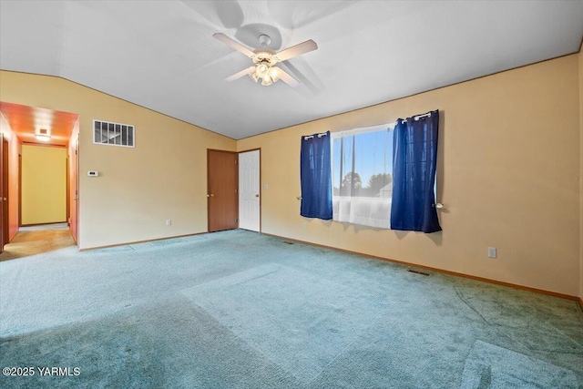 308 Merrick Ave, Sunnyside, WA 98944 - carpeted spare room featuring vaulted ceiling, ceiling fan, and baseboards