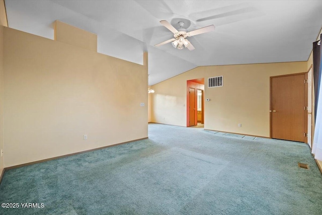 308 Merrick Ave, Sunnyside, WA 98944 - carpeted empty room featuring a ceiling fan, vaulted ceiling, and baseboards