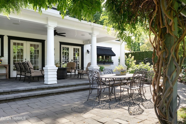 view of patio with french doors and ceiling fan