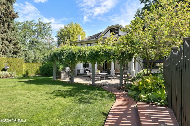 exterior space with a patio area and fence