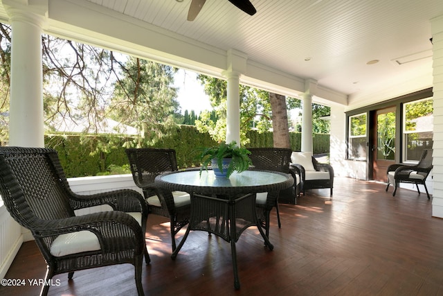 sunroom / solarium with ceiling fan