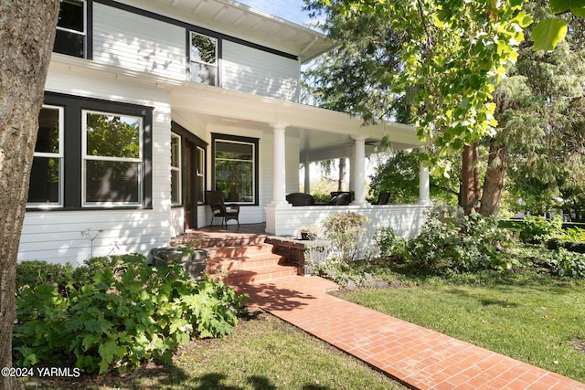 property entrance with a porch