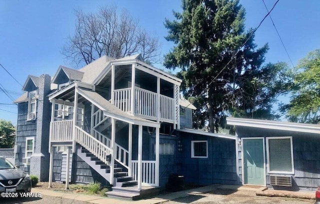705 E Lincoln Ave, Yakima, WA 98901 - rear view of house featuring a balcony and stairway