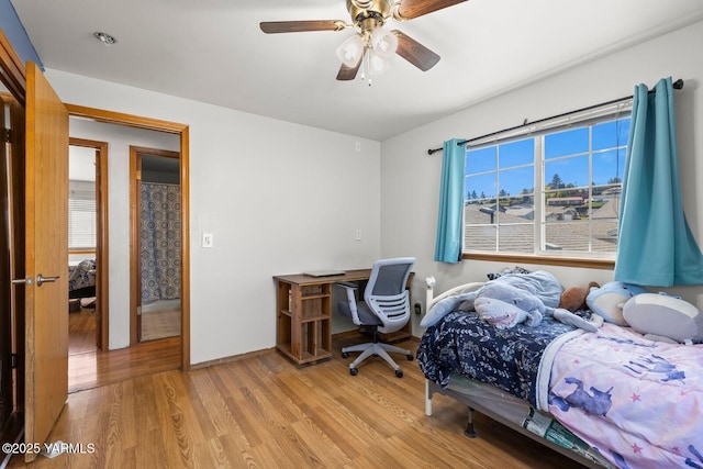 7501 Glacier Way, Yakima, WA 98908 - bedroom with light wood-type flooring, baseboards, and a ceiling fan