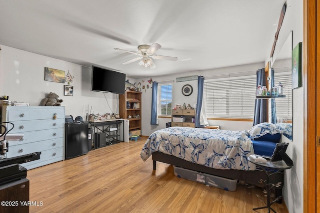 7501 Glacier Way, Yakima, WA 98908 - bedroom featuring wood finished floors and a ceiling fan