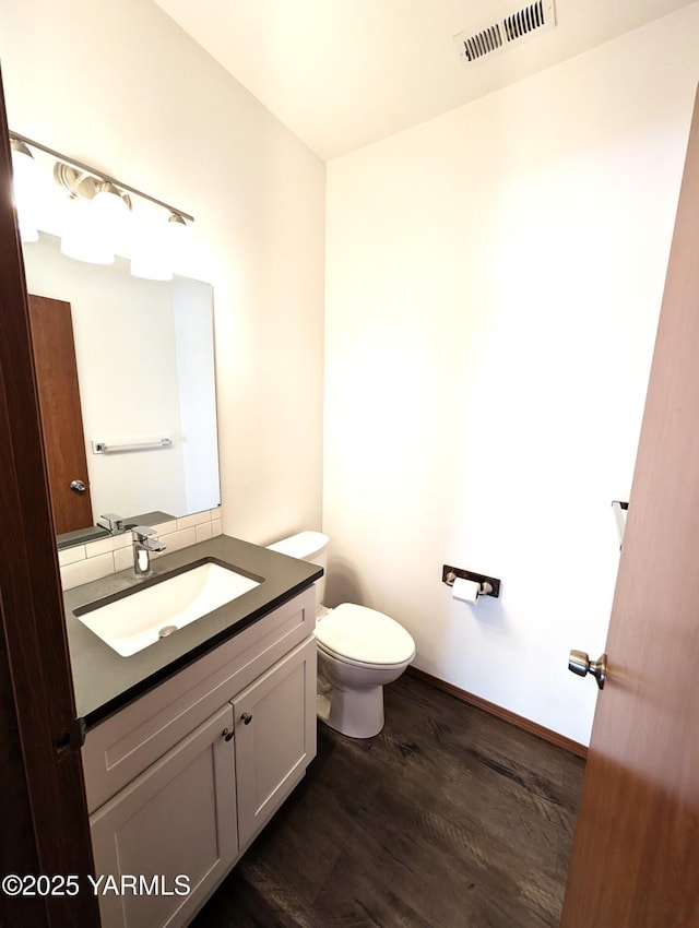 121 Lyle Loop Rd, Selah, WA 98942 - half bath with vanity and wood finished floors