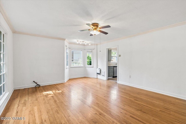 509 N 32nd Ave, Yakima, WA 98902 - unfurnished room with a ceiling fan, light wood-type flooring, and ornamental molding