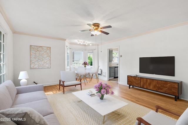 509 N 32nd Ave, Yakima, WA 98902 - living area with ornamental molding, light wood-type flooring, and ceiling fan