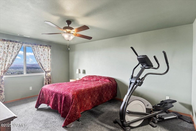 3501 S 40th Ave, Yakima, WA 98903 - bedroom with carpet, baseboards, and a ceiling fan