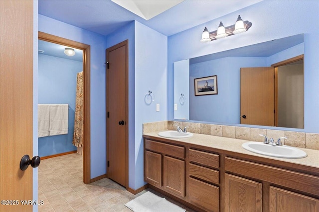 3501 S 40th Ave, Yakima, WA 98903 - full bath featuring double vanity and baseboards