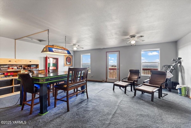 3501 S 40th Ave, Yakima, WA 98903 - carpeted dining space featuring a ceiling fan and a textured ceiling