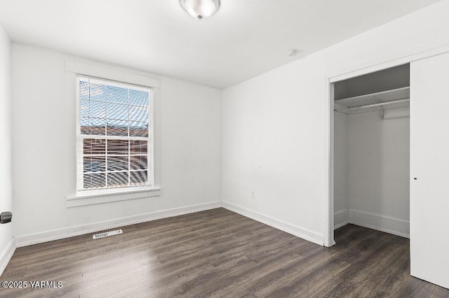 1713 S 10th Ave, Yakima, WA 98902 - unfurnished bedroom with a closet and dark wood finished floors