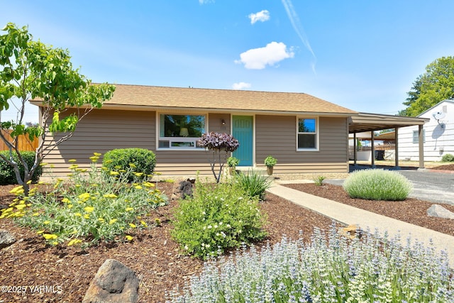 112 N 53rd Ave, Yakima, WA 98908 - view of front facade featuring an attached carport and driveway