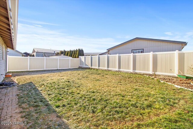 view of yard featuring a fenced backyard