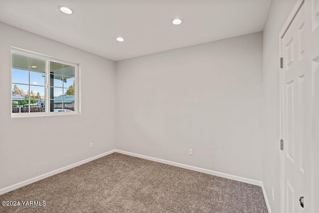 unfurnished bedroom featuring recessed lighting, carpet flooring, and baseboards