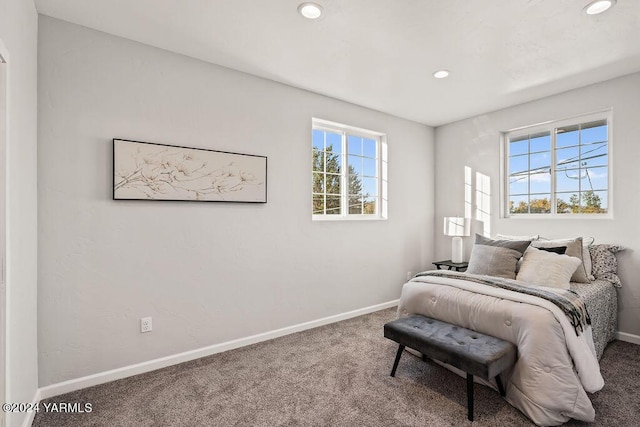 bedroom with recessed lighting, carpet flooring, and baseboards