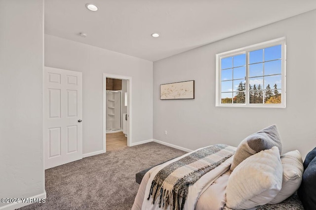 bedroom featuring carpet, ensuite bathroom, baseboards, and recessed lighting