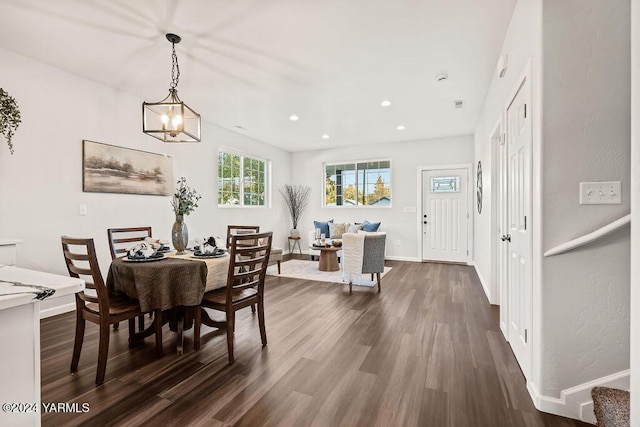 dining room featuring baseboards, dark wood-style flooring, and recessed lighting