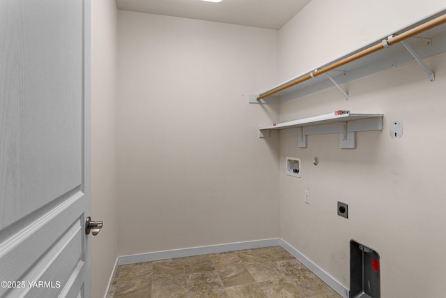 clothes washing area featuring electric dryer hookup, washer hookup, baseboards, and hookup for a gas dryer
