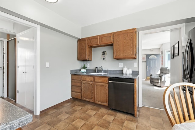 702 S 31st Ave, Yakima, WA 98902 - kitchen featuring stainless steel appliances, brown cabinets, and dark countertops