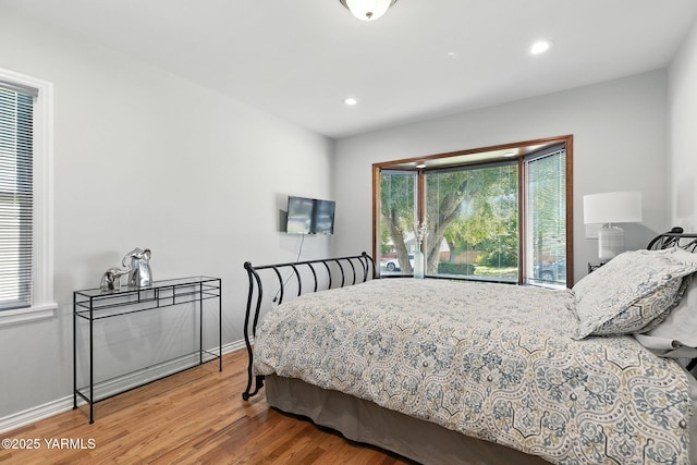 702 S 31st Ave, Yakima, WA 98902 - bedroom with wood finished floors, multiple windows, and recessed lighting
