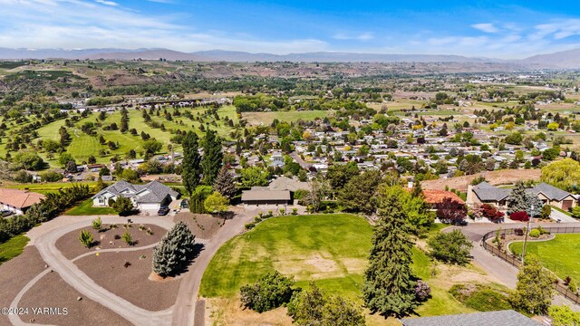 bird's eye view with a residential view and a mountain view