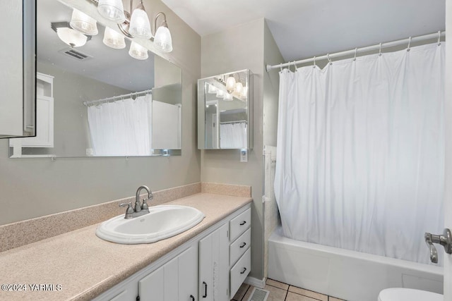 bathroom featuring shower / tub combo, visible vents, toilet, tile patterned flooring, and vanity