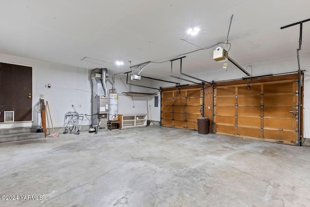 garage featuring a garage door opener and water heater