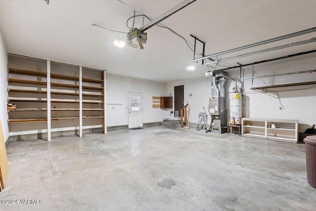 garage with a garage door opener and water heater